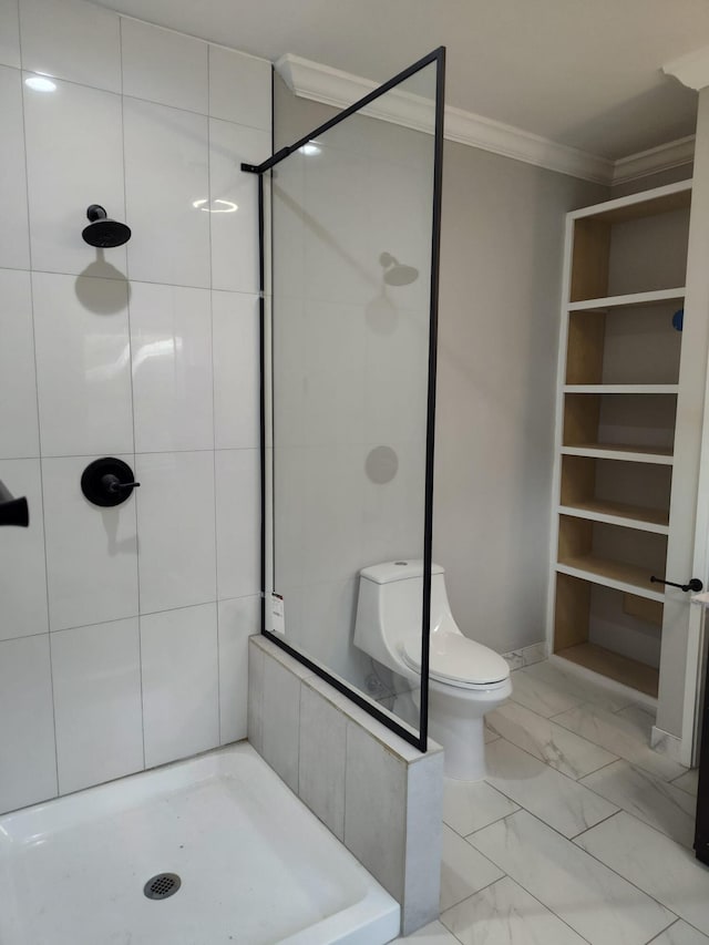 full bath featuring toilet, marble finish floor, a shower stall, and crown molding