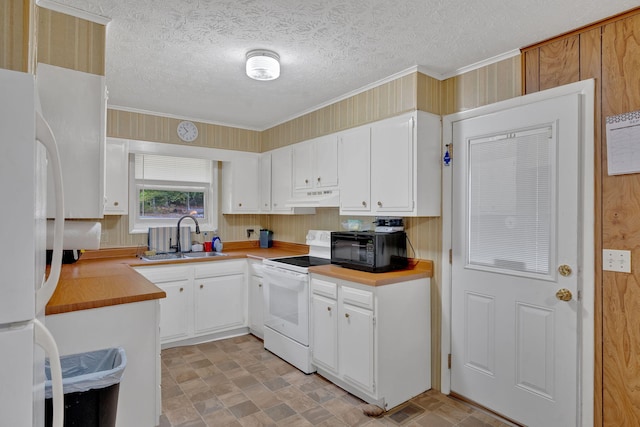 kitchen with custom exhaust hood, a textured ceiling, white appliances, sink, and white cabinetry