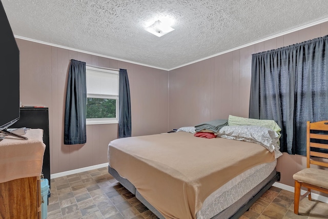 bedroom with crown molding and wood walls