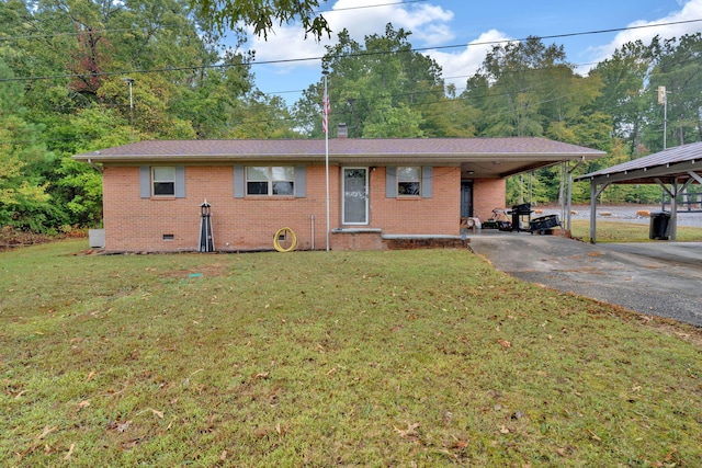 single story home featuring a front yard and a carport