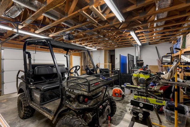 garage featuring a garage door opener