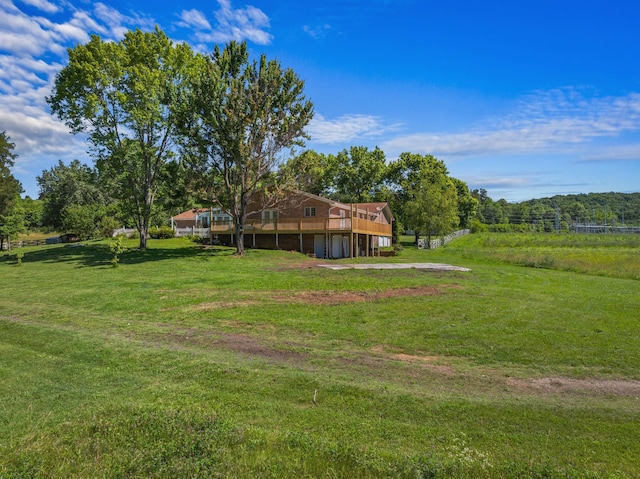 view of yard featuring a deck