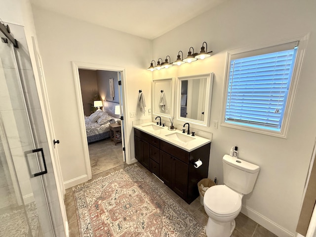 bathroom with a sink, a stall shower, toilet, and ensuite bath