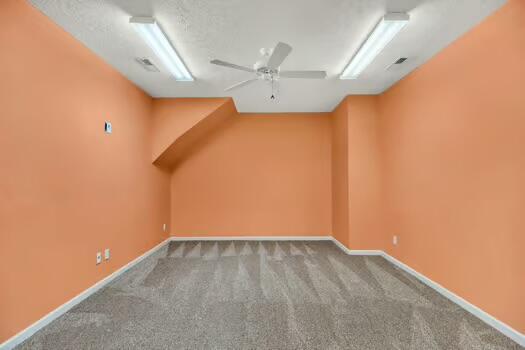 784 Constitution Dr, Jefferson City, TN 37760 - additional living space featuring carpet floors, visible vents, baseboards, and a ceiling fan