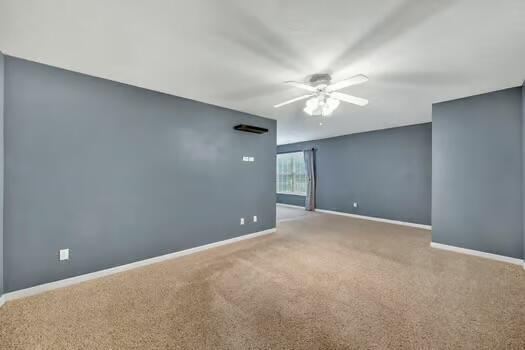 784 Constitution Dr, Jefferson City, TN 37760 - carpeted spare room with ceiling fan and baseboards