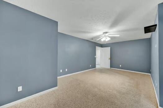 784 Constitution Dr, Jefferson City, TN 37760 - empty room featuring carpet flooring, a ceiling fan, and baseboards