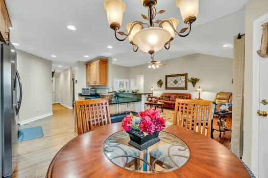 784 Constitution Dr, Jefferson City, TN 37760 - dining room featuring light wood-style floors, recessed lighting, baseboards, and ceiling fan with notable chandelier