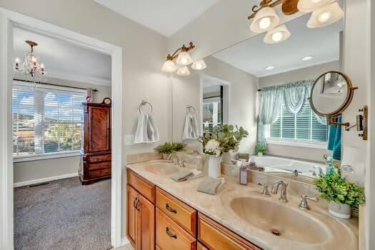 784 Constitution Dr, Jefferson City, TN 37760 - full bath featuring double vanity, baseboards, a sink, and a bath