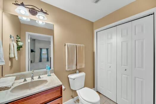 784 Constitution Dr, Jefferson City, TN 37760 - bathroom featuring a closet, vanity, and toilet