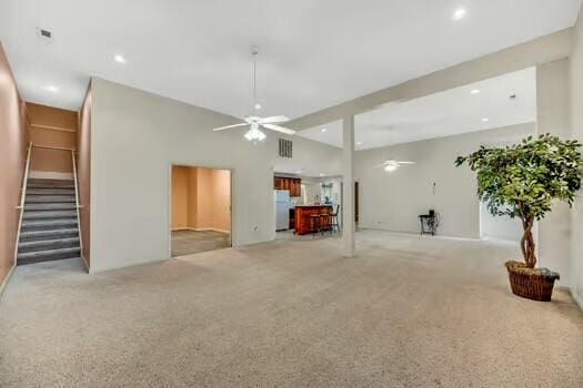 784 Constitution Dr, Jefferson City, TN 37760 - unfurnished living room with carpet, recessed lighting, visible vents, a ceiling fan, and stairs