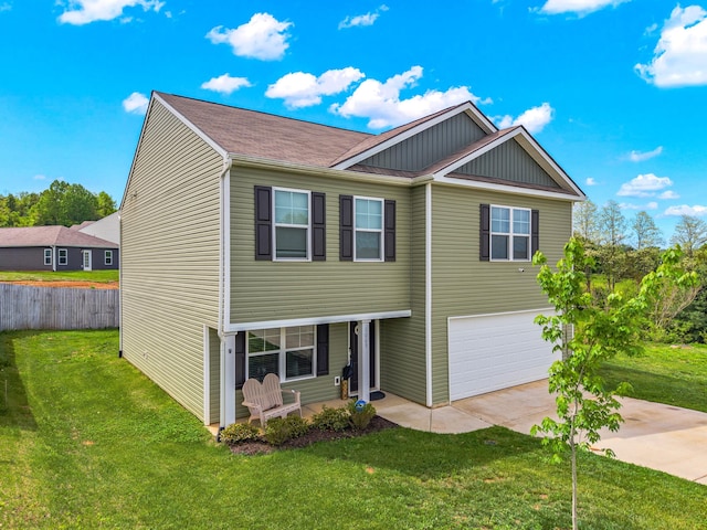 1065 Greenway Dr, Morristown, TN 37813 - view of front of house with fence, a front yard, concrete driveway, and an attached garage