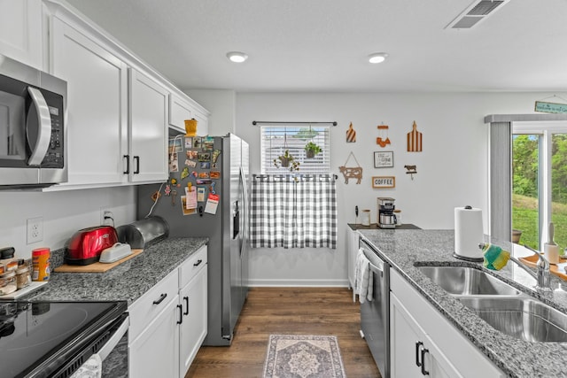 1065 Greenway Dr, Morristown, TN 37813 - kitchen featuring white cabinetry, a sink, appliances with stainless steel finishes, light stone countertops, and dark wood finished floors