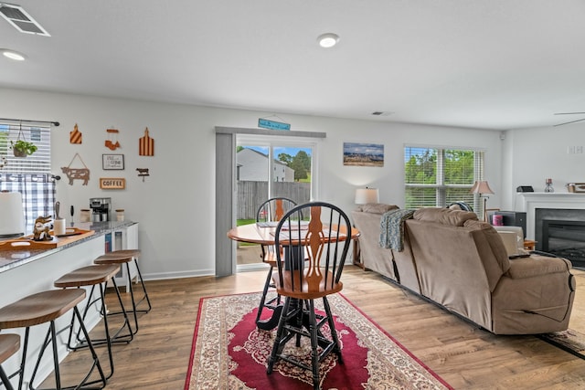 1065 Greenway Dr, Morristown, TN 37813 - living area with recessed lighting, visible vents, wood finished floors, and a healthy amount of sunlight