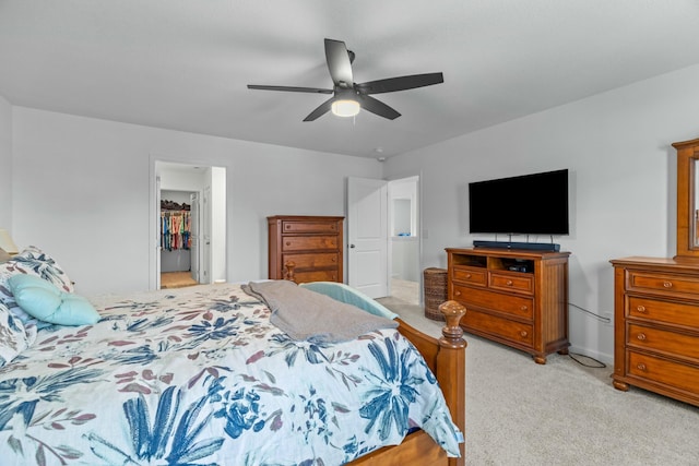 1065 Greenway Dr, Morristown, TN 37813 - bedroom with a spacious closet, a closet, a ceiling fan, and light carpet