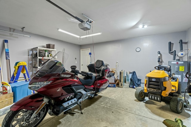1065 Greenway Dr, Morristown, TN 37813 - garage with a garage door opener and electric water heater