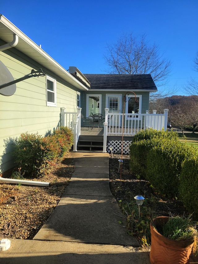 view of front facade with a deck