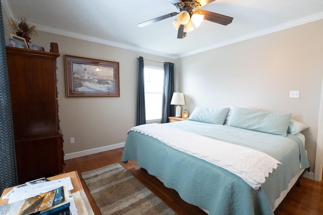 bedroom with ceiling fan, ornamental molding, and dark hardwood / wood-style floors