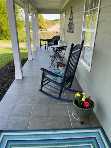 view of patio with a porch