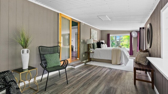 261 Buzzard Roost Rd, Bulls Gap, TN 37711 - bedroom featuring wood finished floors and wooden walls