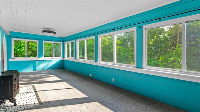 261 Buzzard Roost Rd, Bulls Gap, TN 37711 - unfurnished sunroom with a wood stove