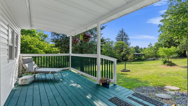 261 Buzzard Roost Rd, Bulls Gap, TN 37711 - wooden terrace with a yard and view of wooded area
