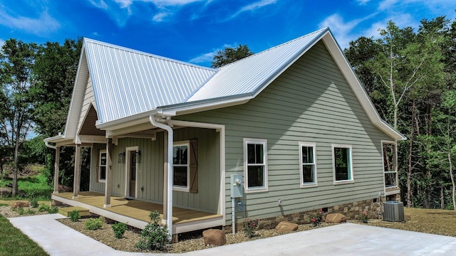 1056 Old Newport Hwy, Dandridge, TN 37725 - view of property exterior with a central AC unit and a metal roof