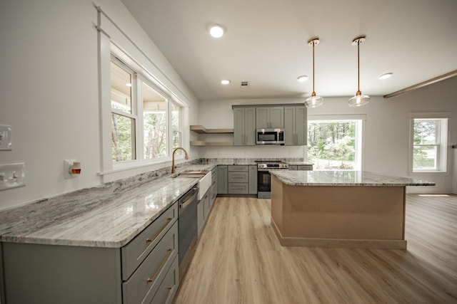 1056 Old Newport Hwy, Dandridge, TN 37725 - kitchen featuring gray cabinets, stainless steel appliances, open shelves, light wood-type flooring, and a center island