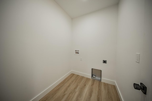 1056 Old Newport Hwy, Dandridge, TN 37725 - laundry room with hookup for an electric dryer, light wood-style floors, and washer hookup