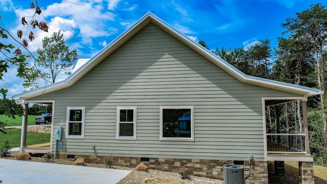 1056 Old Newport Hwy, Dandridge, TN 37725 - view of home's exterior with crawl space and a central AC unit