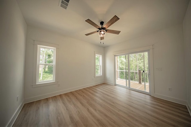 1056 Old Newport Hwy, Dandridge, TN 37725 - spare room with wood finished floors and a ceiling fan