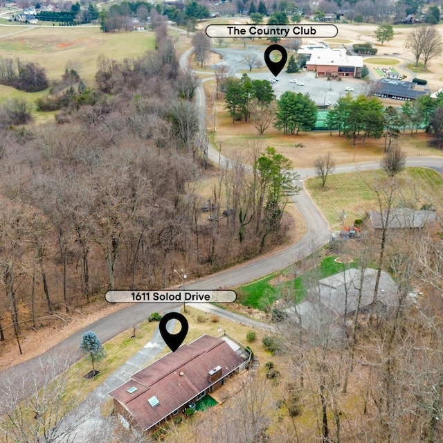 birds eye view of property with a rural view