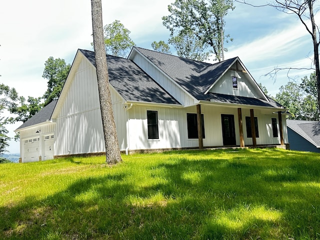 2790 Lowe Dr, Talbott, TN 37877 - view of front of home featuring covered porch, a shingled roof, driveway, board and batten siding, and a garage
