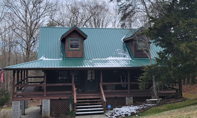 view of front of house featuring metal roof