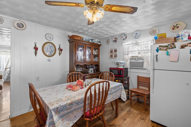 245 Fox Branch Rd, Kyles Ford, TN 37765 - dining area featuring light wood finished floors, a ceiling fan, cooling unit, and healthy amount of natural light