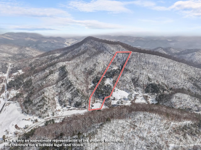 245 Fox Branch Rd, Kyles Ford, TN 37765 - snowy aerial view featuring a mountain view and property boundaries highlighted