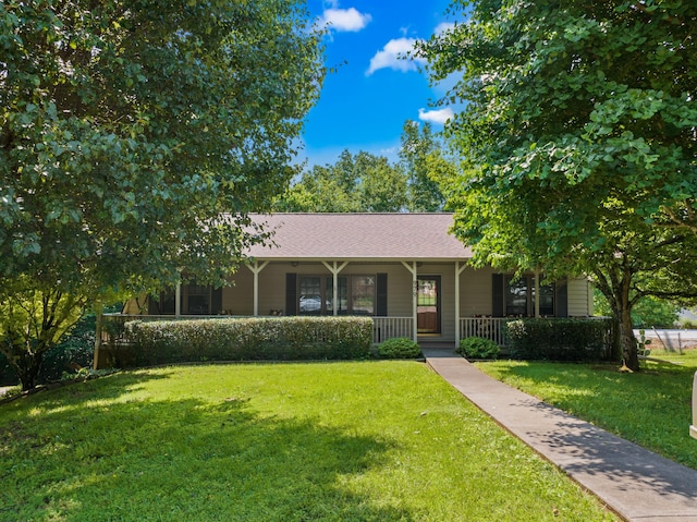 979 Cedar Trace Ln, Morristown, TN 37814 - view of front of property with a porch, a front lawn, and roof with shingles
