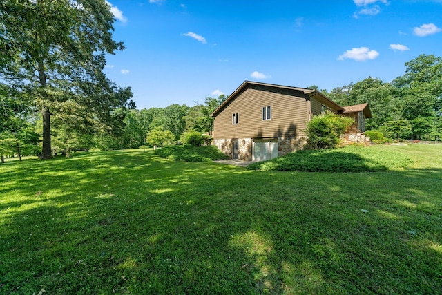 1869 Universal Rd, New Market, TN 37820 - view of home's exterior featuring stone siding and a lawn