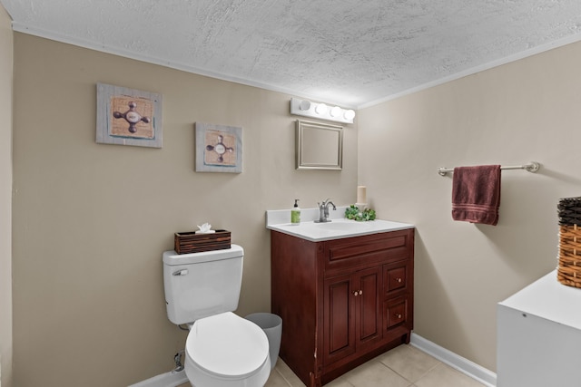 bathroom with baseboards, toilet, tile patterned flooring, a textured ceiling, and vanity