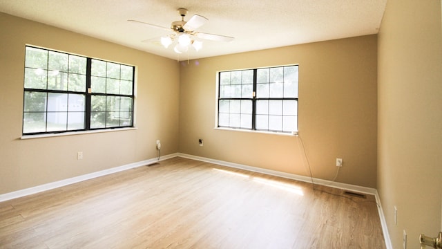 2131 Ted Moore Rd, Dandridge, TN 37725 - unfurnished room with wood finished floors and a ceiling fan