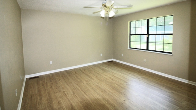 2131 Ted Moore Rd, Dandridge, TN 37725 - empty room featuring wood finished floors and ceiling fan