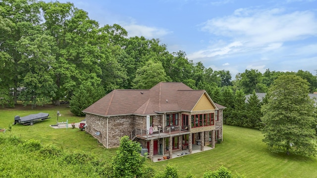 2224 Ted Moore Rd, Dandridge, TN 37725 - back of house with a patio, a yard, brick siding, a deck, and roof with shingles