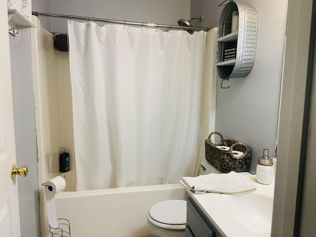 full bathroom featuring vanity, toilet, and shower / tub combo with curtain