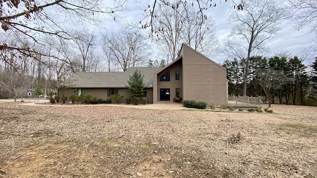 view of front of property featuring a wooden deck