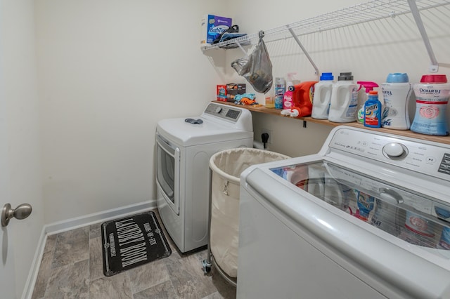 laundry area featuring independent washer and dryer