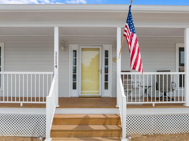 1114 Lake Ridge Dr, Dandridge, TN 37725 - view of exterior entry featuring covered porch