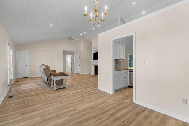 1114 Lake Ridge Dr, Dandridge, TN 37725 - unfurnished living room featuring a fireplace, lofted ceiling, recessed lighting, light wood-type flooring, and a ceiling fan