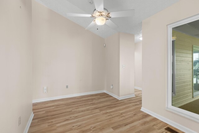1114 Lake Ridge Dr, Dandridge, TN 37725 - empty room with light wood finished floors, ceiling fan, and baseboards