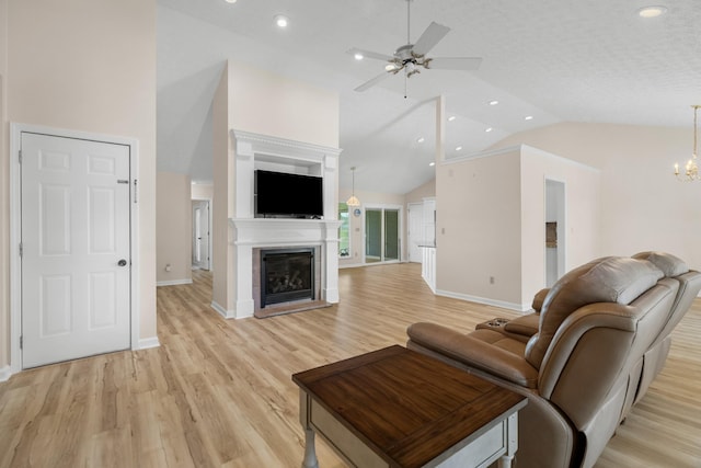 1114 Lake Ridge Dr, Dandridge, TN 37725 - living room featuring vaulted ceiling, light wood-style floors, a ceiling fan, baseboards, and recessed lighting