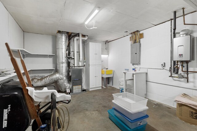 1114 Lake Ridge Dr, Dandridge, TN 37725 - unfinished basement featuring electric panel, tankless water heater, and concrete block wall