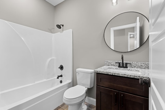 full bathroom with tile patterned floors, shower / washtub combination, vanity, and toilet